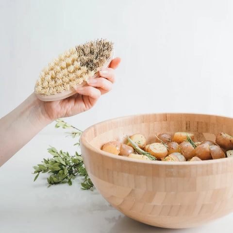 This vegetable brush provides a soft and hard side of bristles, making it ideal for cleaning everything from root vegetables to tomatoes and berries.