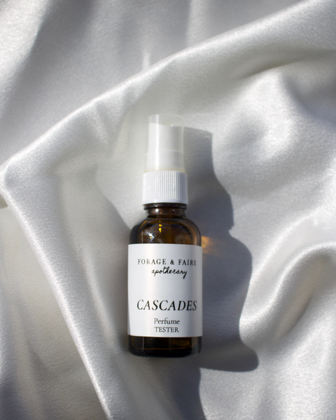 Our Cascades Perfume is fresh, grounding, and quietly invigorating. Cascades captures the essence of the Pacific Northwest - fresh mountain air and flowing fresh water. This blend is a clean yet cozy scent that feels like standing among trees with sunlight filtering through.
