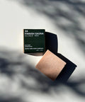 Deep in the woods, traditional smoke sauna with Aurora Borealis dancing above your head in Finland. Grounding scents of eucalyptus, pine, fir, and cedar wood meet pink clay and Himalayan salt for a mineral-rich, forest-inspired cleanse.