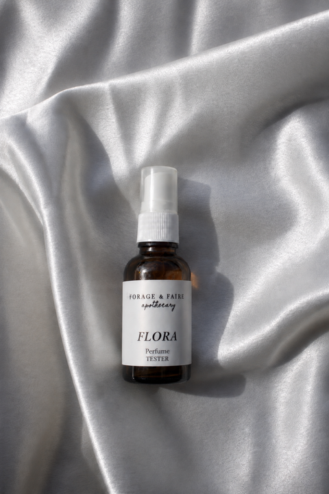 Our Flora Perfume is rich, romantic and inspired by moonlit gardens. Flora is both elegant and grounding with soft floral notes unfolding into a deep, velvety warmth, creating a scent that feels both timeless and quietly seductive. Hints of sweetness and spice linger beneath the surface, adding depth and intrigue to its delicate beauty.