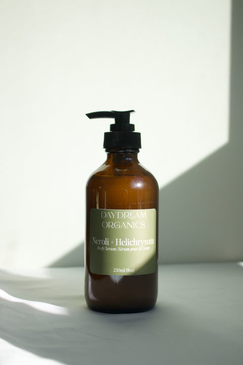Our Body Serum is a rich, deeply nourishing natural skin treatment designed to replenish dry skin and lock in lasting moisture. Handcrafted with a blend of organic oils, butters, and waxes, this serum melts into the skin effortlessly leaving it feeling soft, smooth, and comfortably hydrated.&nbsp;