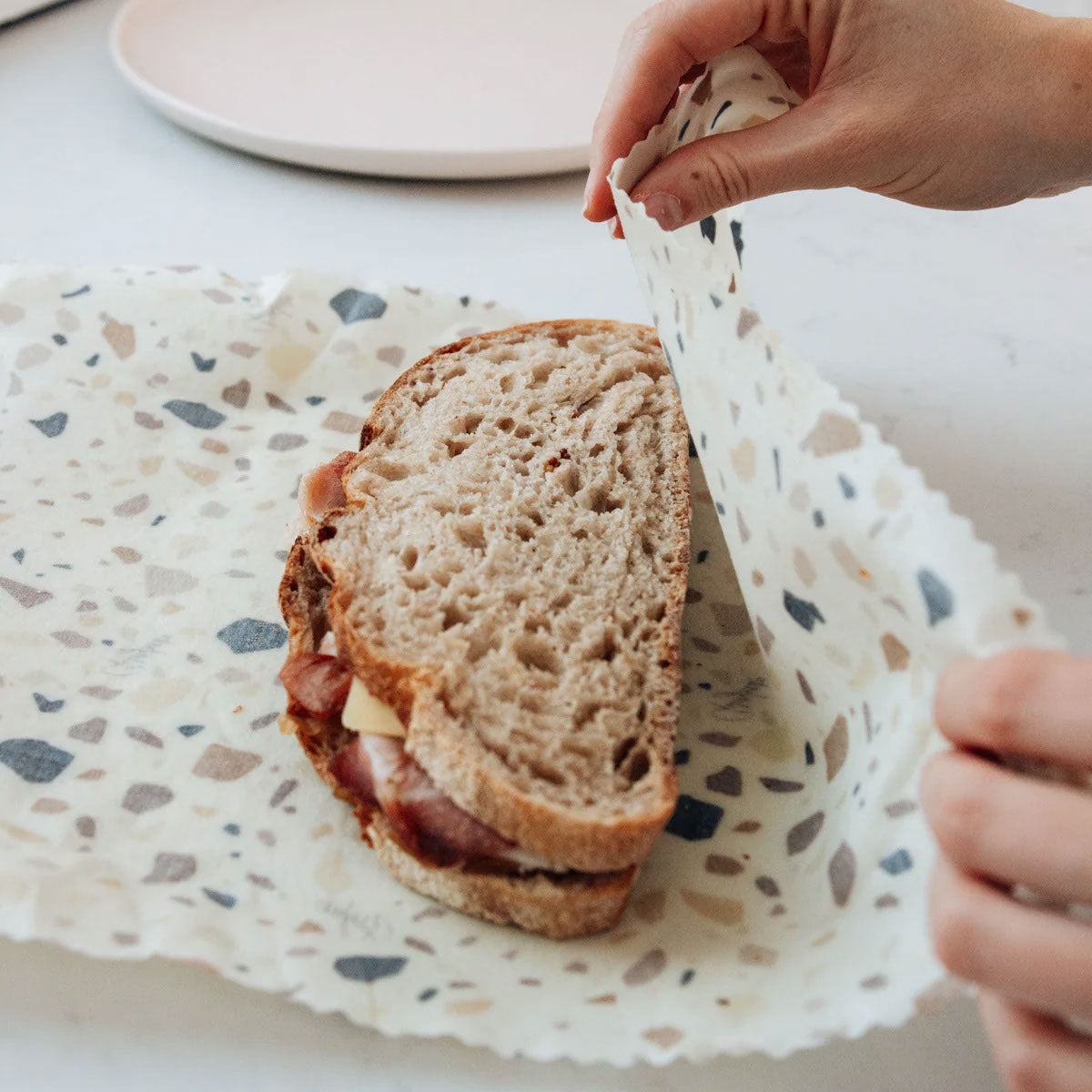 These beeswax food wraps are a reusable and sustainable alternative to plastic wrap! Use them to wrap produce, cover leftovers and more! 