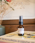 Our Gold Perfume is a luxurious blend of organic sandalwood, vanilla, benzoin, amyris, and clove essential oils. Experience a deep, warming fragrance with grounding and calming effects.