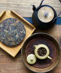 Our organic Harvest Moon 2016 Old Tree White Tea is a particularly sweet white tea cake from the old tree forest in Huazhu Liangzi. It offers beautiful notes of baked fruit, mulled wine and vanilla, with a long and lingering sweetness.