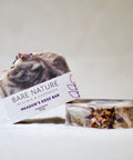 Bare Nature's Meadow's Edge Bar Soap is inspired by the feeling of walking barefoot in an alpine meadow. The soap has a deep, woodsy, floral scent and offers a rich and creamy lather that leaves your skin feeling nourished and clean.