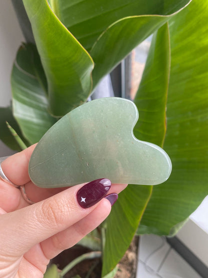 Gua sha is a modality of traditional Chinese medicine that uses a stone tool that runs over the skin to break up tension due to stagnation from water retention, muscle tightness, or other congestion.