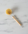 This Dish Brush by Redecker is made with untreated beechwood and tampico plant fibres. This brush is strong and firm, making it perfect for cleaning all pots and pans.