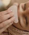 Gua sha is a modality of traditional Chinese medicine that uses a stone tool that runs over the skin to break up tension due to stagnation from water retention, muscle tightness, or other congestion.