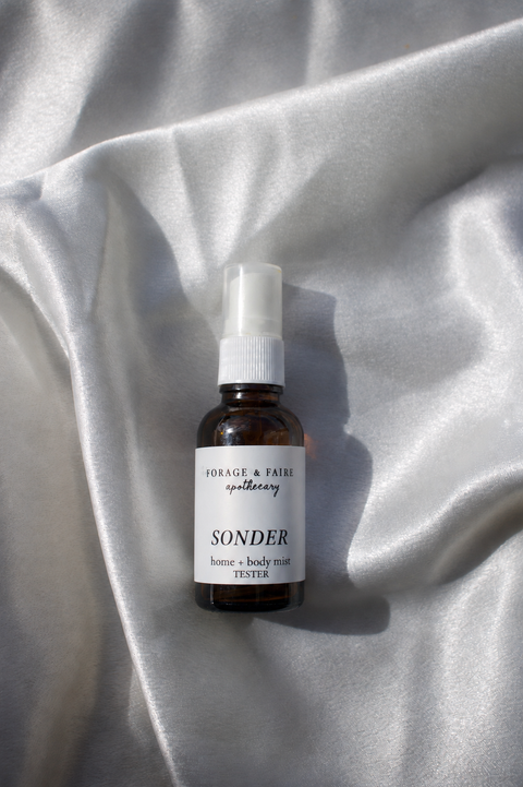 Sonder is a soft, comforting home + body mist that feels both familiar and quietly reflective. Bright citrus meets the aroma of the woods and is balanced out by a gentle warmth that lingers on the skin and in your space. Simple yet deeply layered, it carries a calm, thoughtful atmosphere - like a quiet moment of connection in the middle of an ordinary day.