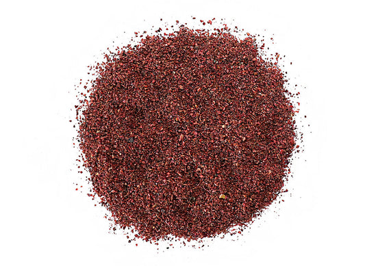 Sumac Berry (Rhus coriaria) is a member of the cashew family (Anacaridaceae) and a relative to poison ivy, poison sumac, and mango.  Sumac Berry is safe to consume and is known for its sour, tart flavour profile that has been used in a variety of culinary recipes for many centuries. Sumac Berry also has a long history of use in traditional modalities of healing for its health supporting properties.