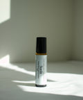 Our Sunlit perfume roll-on is bright, warm and softly grounding. Sunlit captures the feeling of golden light on skin with notes of sparkling citrus and smooth warmth. Sunlit is a balanced scent that is both uplifting and deeply comforting - like liquid sunshine.